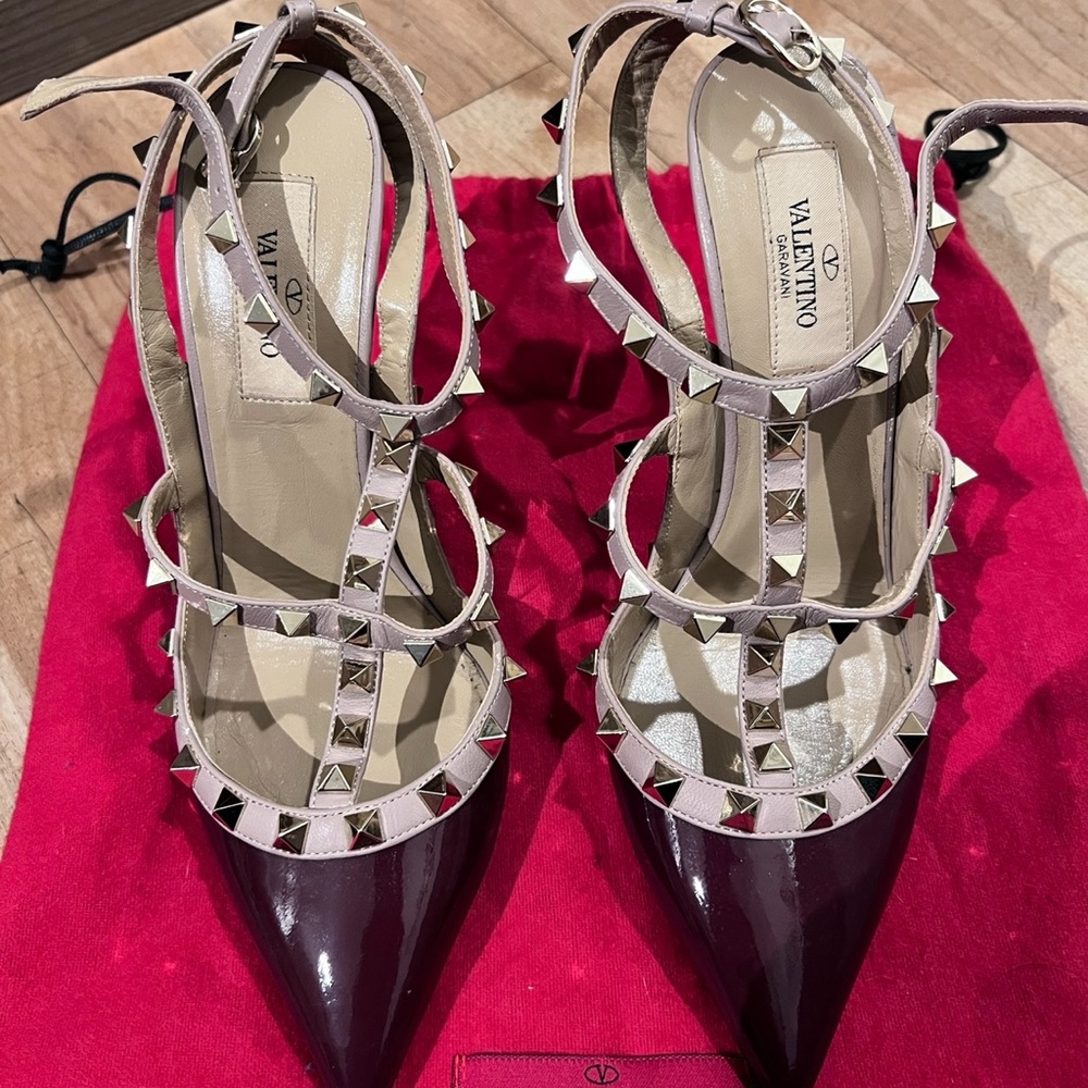 Valentino Rockstud Pumps in deep maroon color.